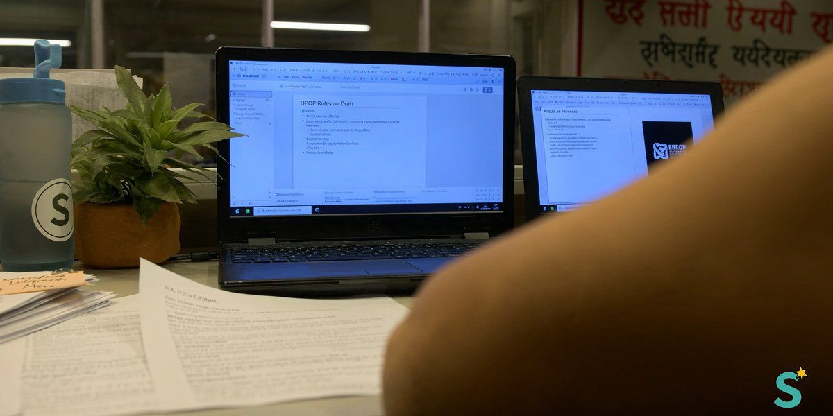DPDP Act vs GDPR, an Indian SaaS compliance lead reviewing dual mapping at her Pune workstation, Sirius Star
