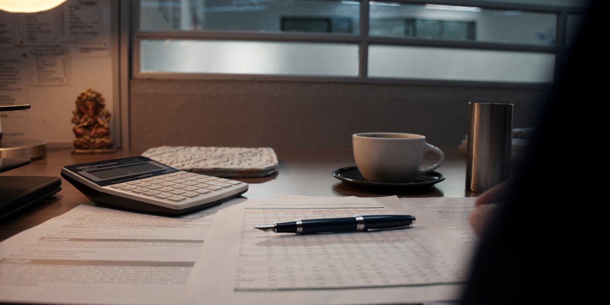 device refresh policy India — CFO desk reviewing one-page policy, Sirius Star
