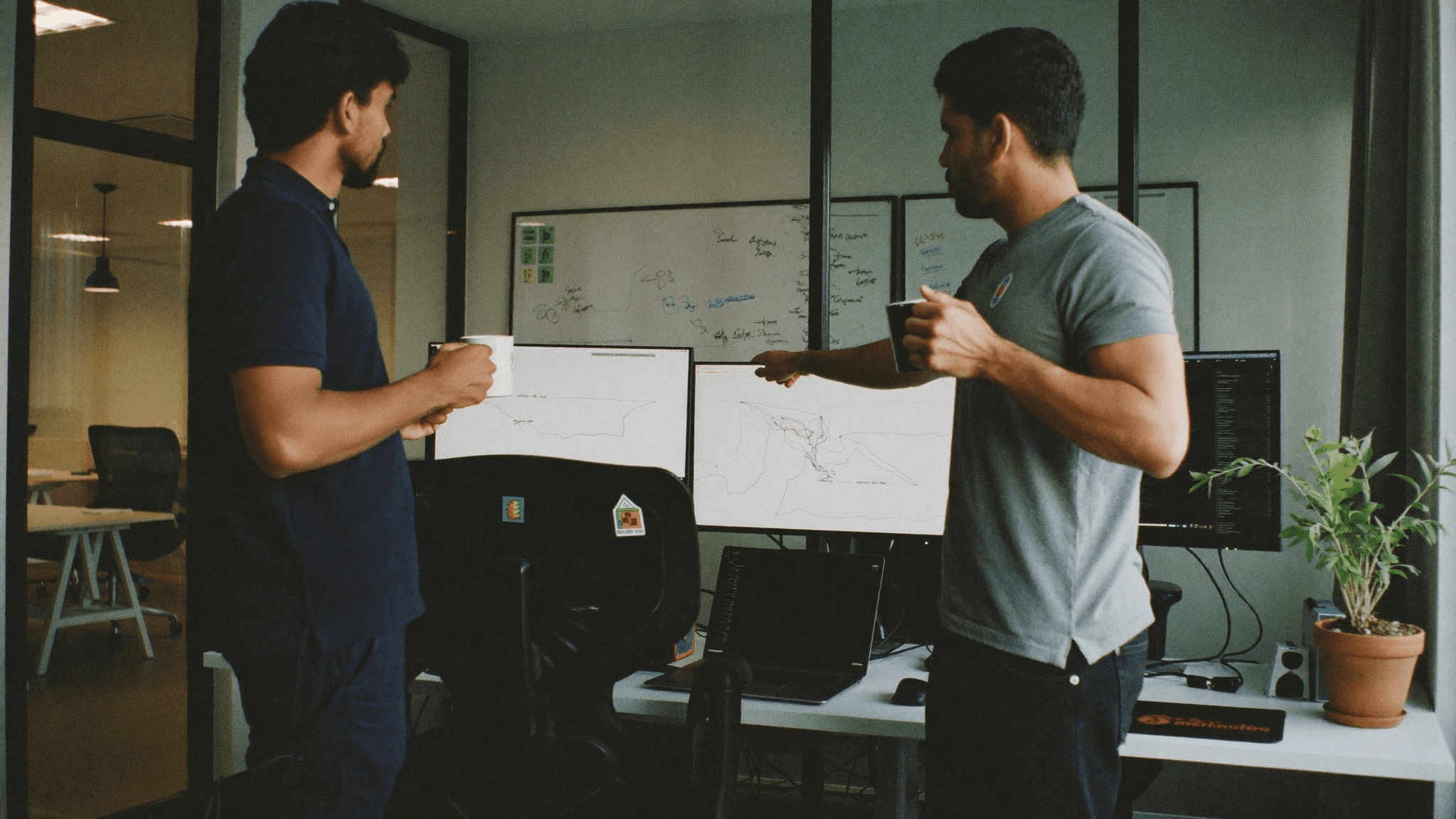 Network operations bay at a Bengaluru SaaS firm comparing latency between a legacy firewall stack and a Cato Networks SASE pilot