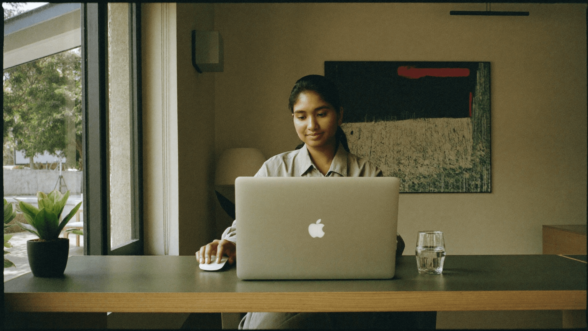 Apple Mac for business India receptionist test on Monday morning, new silver MacBook closed at a Bengaluru agency reception desk